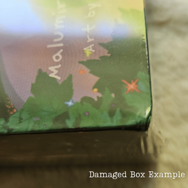 Photo depicts Cat Aura Tarot deck with a damaged box corner.