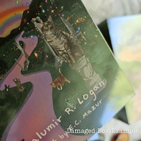 Photo depicts Cat Aura Tarot deck with damage to the front of the box/shrink wrap.